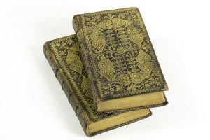 The Holy Bible (Edinburgh, 1758). This two volume set of the Bible is hand-stamped with an elaborate pattern that was typical of refined Scottish bindings in the 18th century.